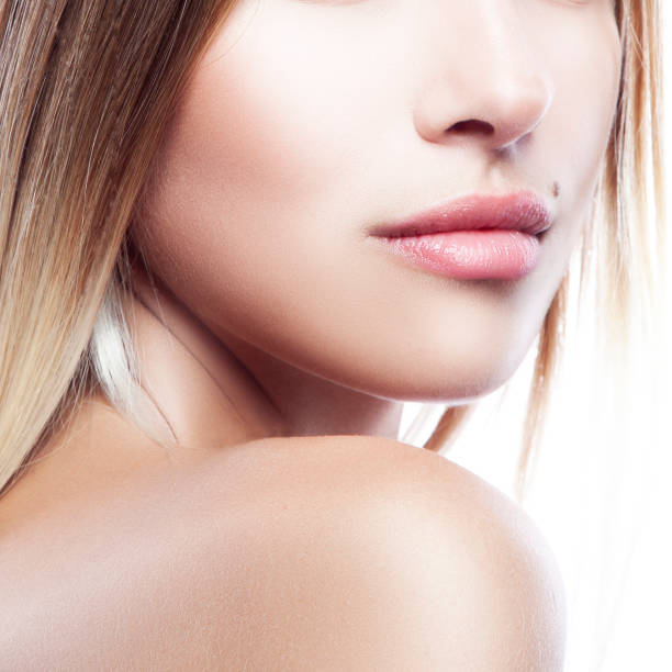 istock Lips, face, shoulders of beautiful model girl. 1177802253