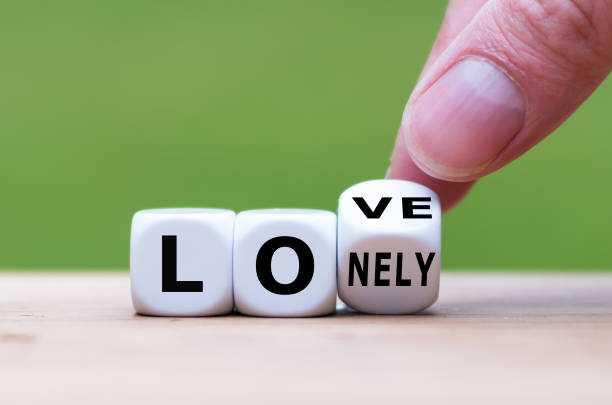 istock Fall in love concept. Hand turns a dice and changes the word 