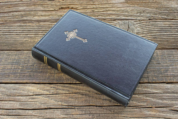 Holy bible on wooden background