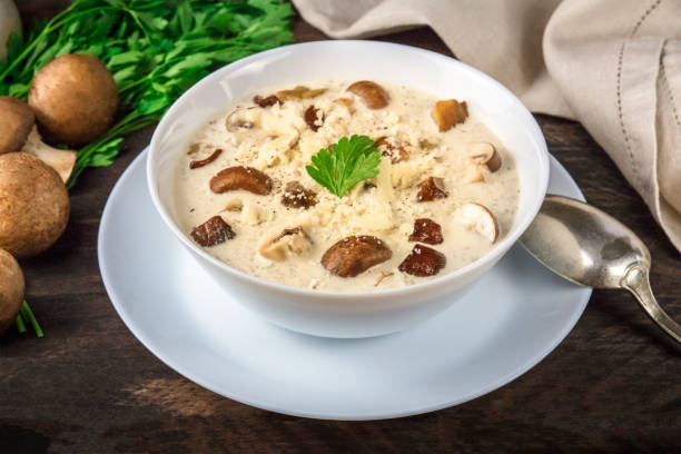 istock Mushroom soup with ingredients on a dark rustic wooden background, selective focus 1177814482