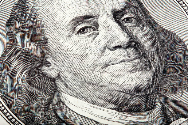 istock Benjamin looking at you on money, stacked macro photo. 1177815649