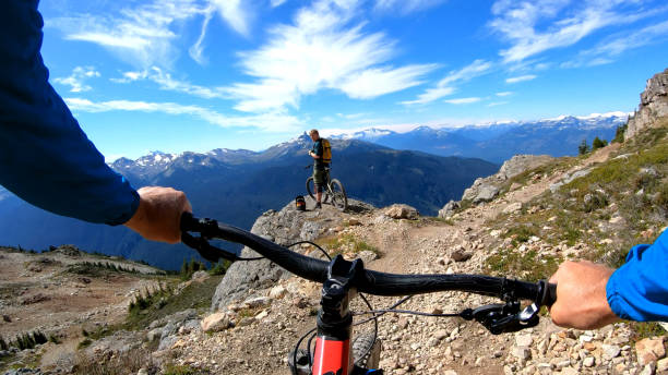 istock POV of mountain biker descending mountaintop trail 1177821295