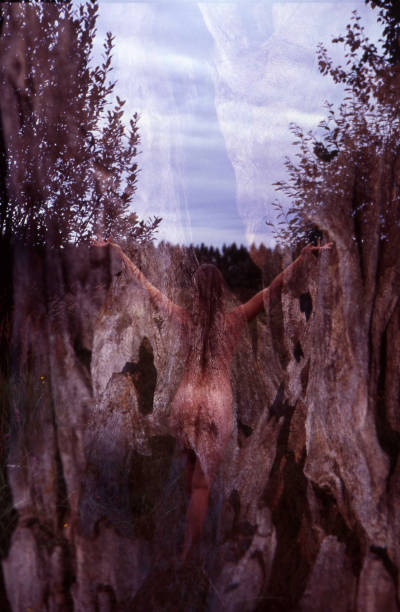 istock Slender nude girl and tree bark close-up. 1177821372