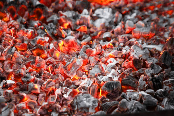 istock Texture red hot coals, selective focus. Barbecue grill dark background 1177823158