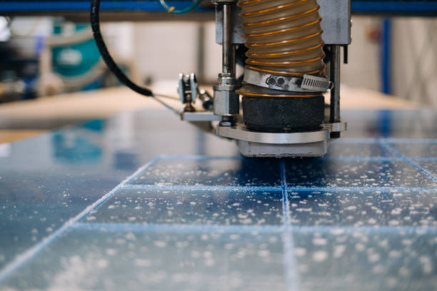 milling cutter cuts plastic part on robotized production line - acrylic imagens e fotografias de stock