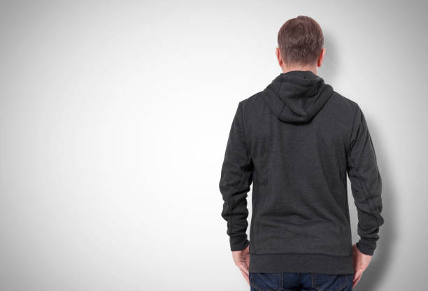 istock Man in black sweatshirt, black hoodies rear view. grey background 1177827483