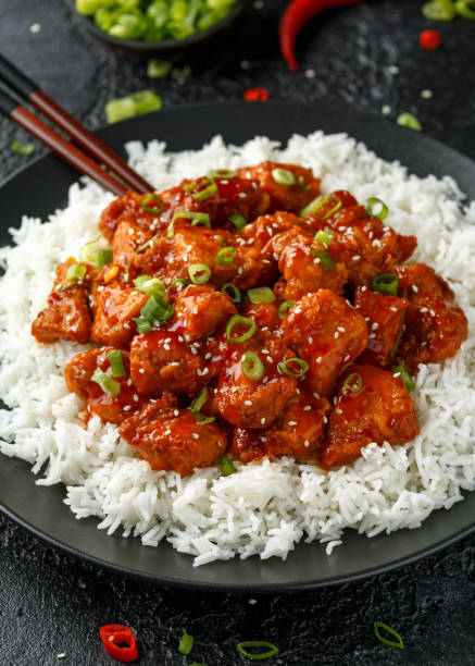 istock Tso's chicken with rice, green onion and broccoli 1177828930