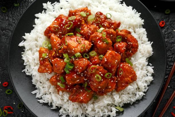 istock Tso's chicken with rice, green onion and broccoli 1177829429