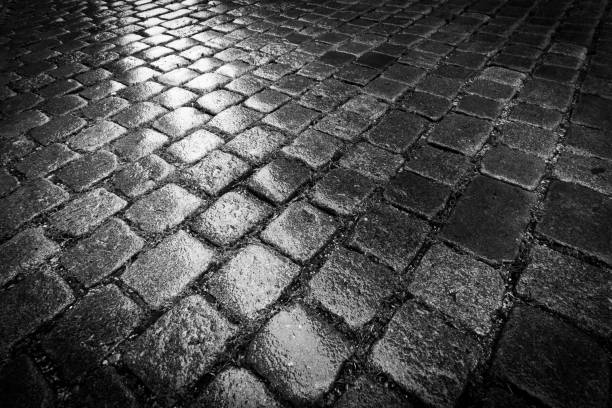istock Cobblestone Street Night 1177830887