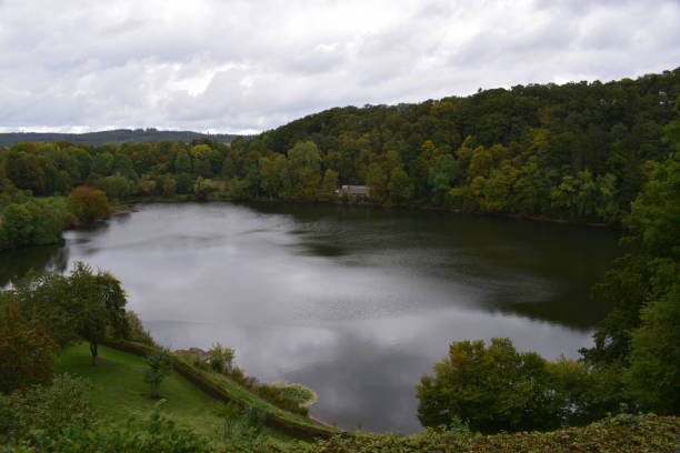 istock caldera lake Ulmener Maar in autumn 1177834721