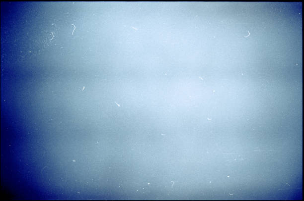 istock Noisy blue film frame with scratches, dust and grain 1177836317