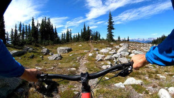 istock POV of mountain biker descending mountaintop trail 1177838982