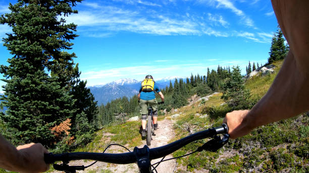 istock POV of mountain biker descending mountaintop trail 1177838997