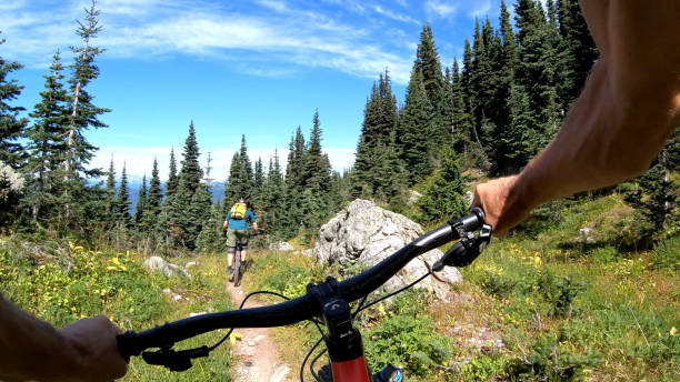 istock POV of mountain biker descending mountaintop trail 1177839200