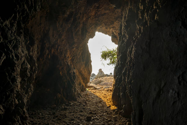 istock scenic of light on exit from cave background in landscape lighting design 1177841560