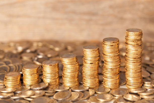 istock Columns of Bulgarian coins growing up 1177842774