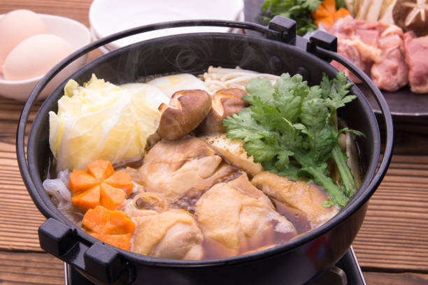 Chicken sukiyaki Chicken sukiyaki crown daisy stock pictures, royalty-free photos & images