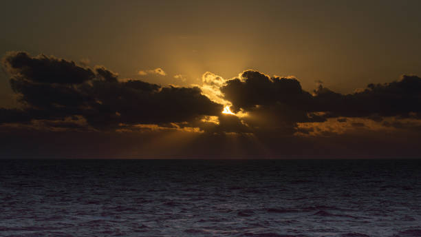 istock Stunning sunset over a purple Caribbean Sea. 1177845641