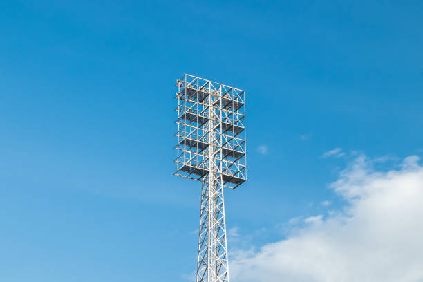 Sport light on blue sky background in stadium