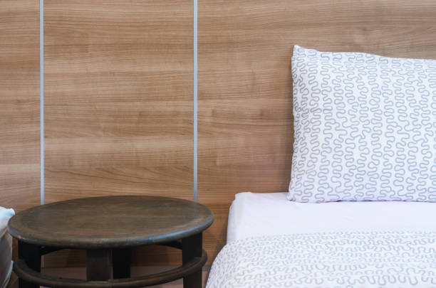 istock closeup modern white bedroom with bed and pillow clean up comfortable room. 1177859088