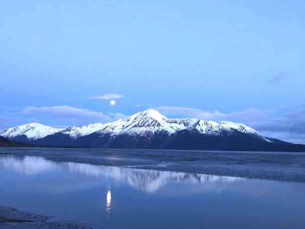 Midnight of May 2019 Seward Highway in Chugach State Park close by Anchorage Alaska still has daylight besides moonlight Midnight of May 2019 Seward Highway in Chugach State Park close by Anchorage Alaska still has daylight besides moonlight alaska us state photos stock pictures, royalty-free photos & images