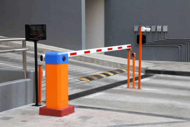 istock Automatic barrier gate with RFID Card dispenser system for car parking. 1177859460