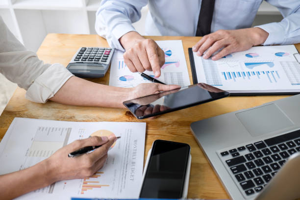 istock Two business team manager having a discussing with new project success financial statistics, Partner meeting professional investor working start up project for both company with document 1177859776