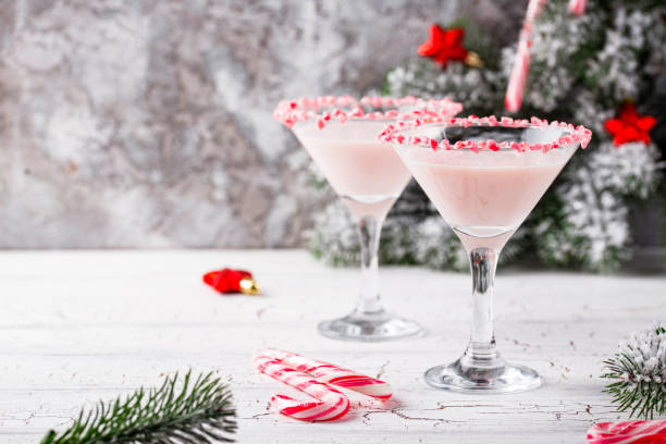 istock Pink peppermint martini with candy cane rim 1177860348