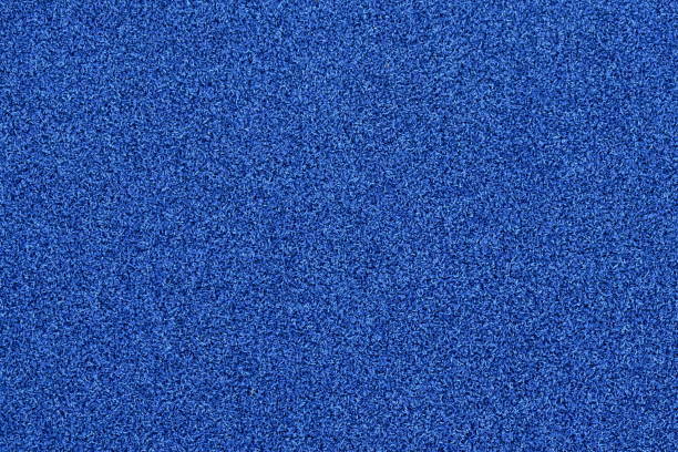 istock blue football artificial turf texture and background 1177860815
