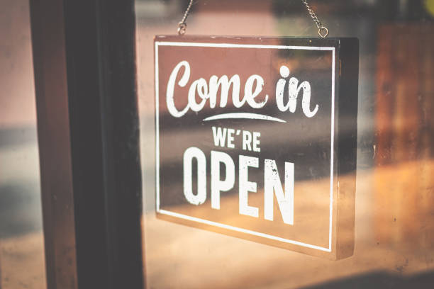 istock Welcome open sign on door .vintage tone. 1177868949