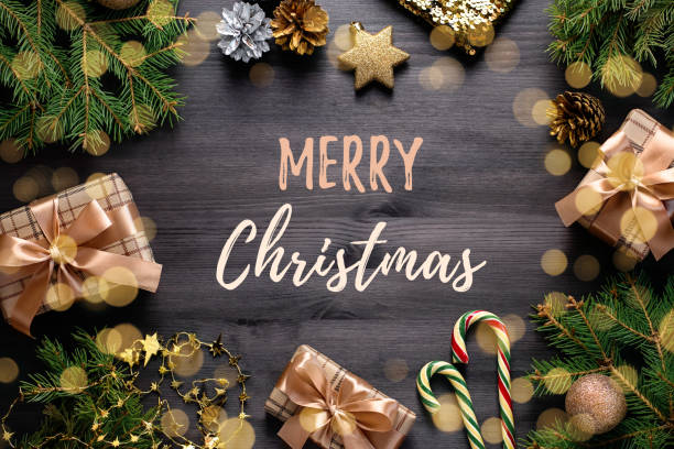 istock Merry Christmas card with pine, wrapped presents, golden elements, candy canes, confetti. 1177871764