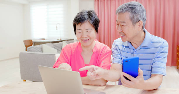 istock elder couple use smart phone 1177873144