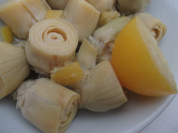 istock Artichoke hearts served with candied lemon 1177877319