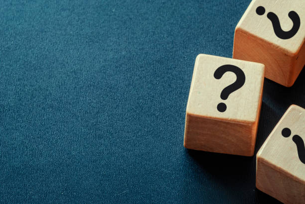 istock Side border of question marks on wooden cubes 1177879002