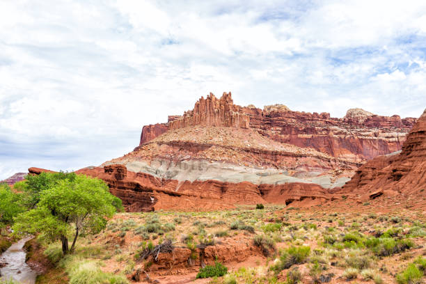 istock Red rock sandstone formations landscape view with green river in summer in Capitol Reef National Monument in Utah 1177883242