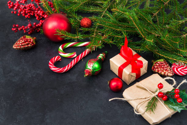 istock fir branches, lollipops, cones, red balls, gift  box  red ribbon, Christmas, 1177883299