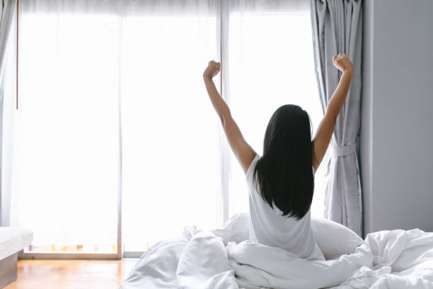 istock Woman wake up in bed 1177884990