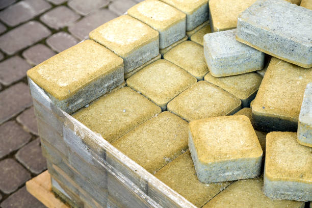 istock Installation of stone paving slabs in a yard. 1177886857
