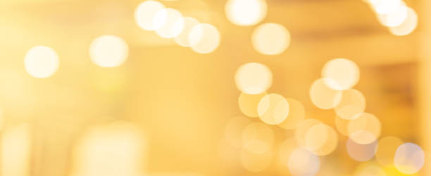 istock abstract blur beautiful soft gold color background with circle bokeh light for christmas festival and happy new year season design as banner concept 1177887817