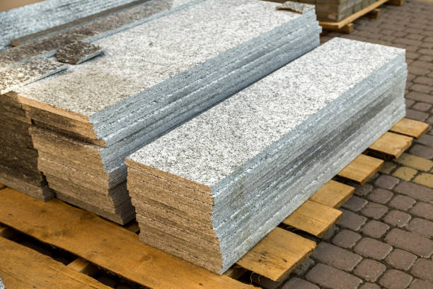 istock Piles of granite marble slabs.  Stone sheets for decorative construction. 1177890939