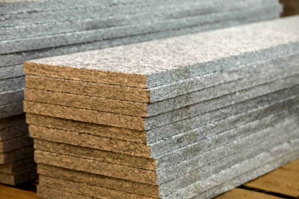 istock Piles of granite marble slabs.  Stone sheets for decorative construction. 1177890946