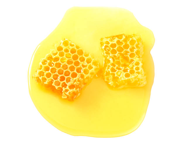 istock Honeycomb with honey isolated on white background. top view 1177893419