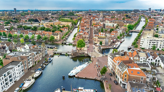 Aerial drone view of Leiden town cityscape from above, typical Dutch city skyline with canals and houses, Holland, Netherlands