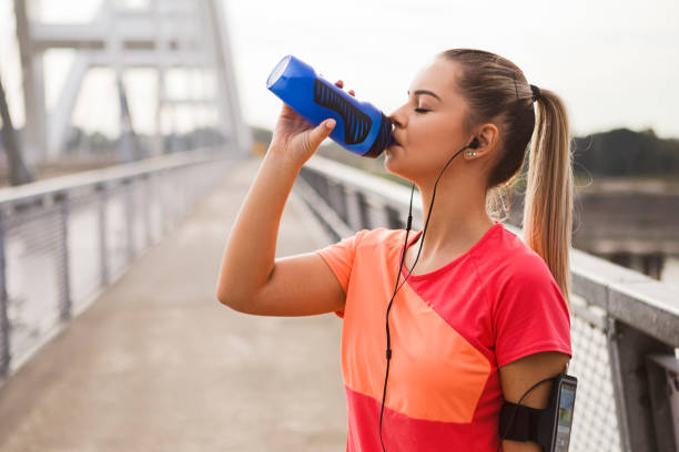 istock Young woman Refreshing after running 1177896108