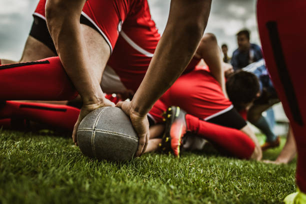istock Close up of unrecognizable rugby player with ball on a match. 1177896943