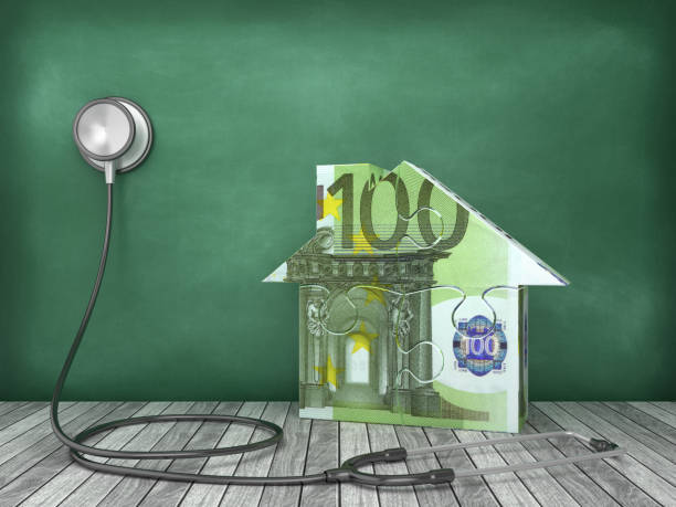 istock Stethoscope with Euro Puzzle House on Chalkboard Background - 3D Rendering 1177898622