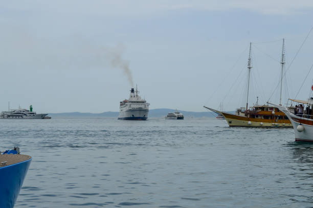 SPLIT, CROATIA - JUNE 15:Traditional wooden sailboat in port of Split, Croatia on June 15, 2019.