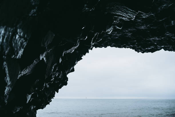 istock View from the cave on Reynisfjara beach in Iceland. Cold Atlantic ocean 1177899949