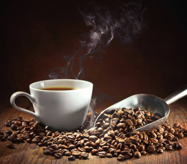 istock Coffee cup and coffee beans with bag, scoop and steam 1177900360