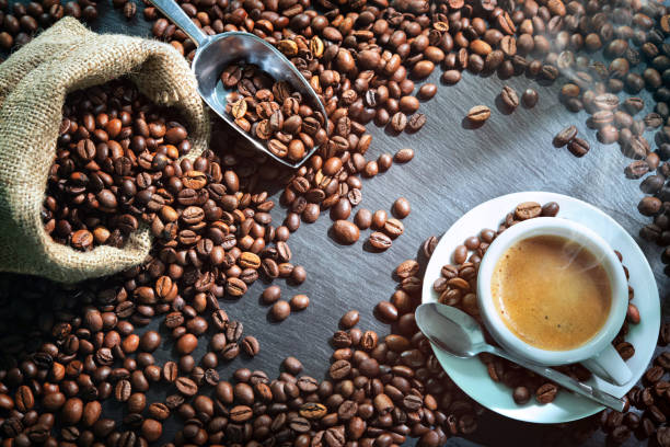 istock Cup of espresso with coffee beans 1177900366